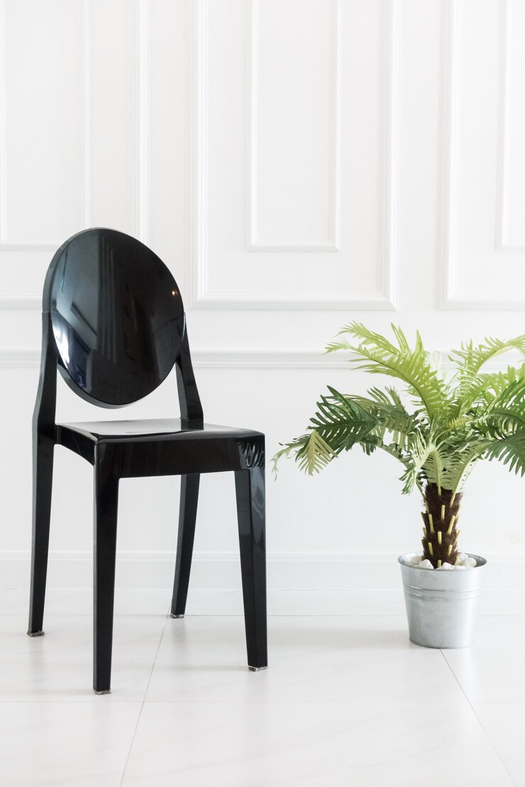 empty-chair-with-vase-plant_74190-2078.jpg